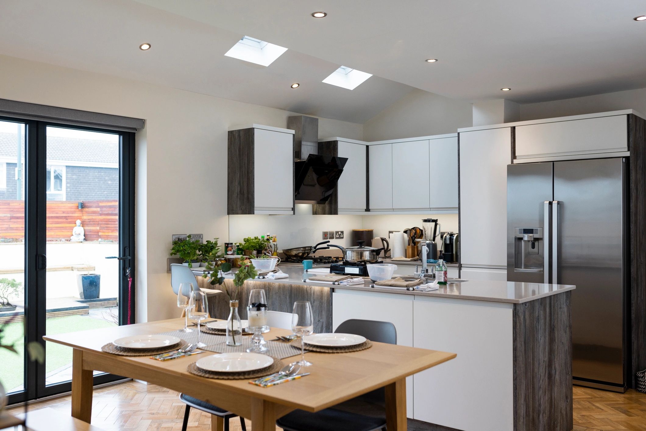 Modern open-plan dining space styled for a celebration