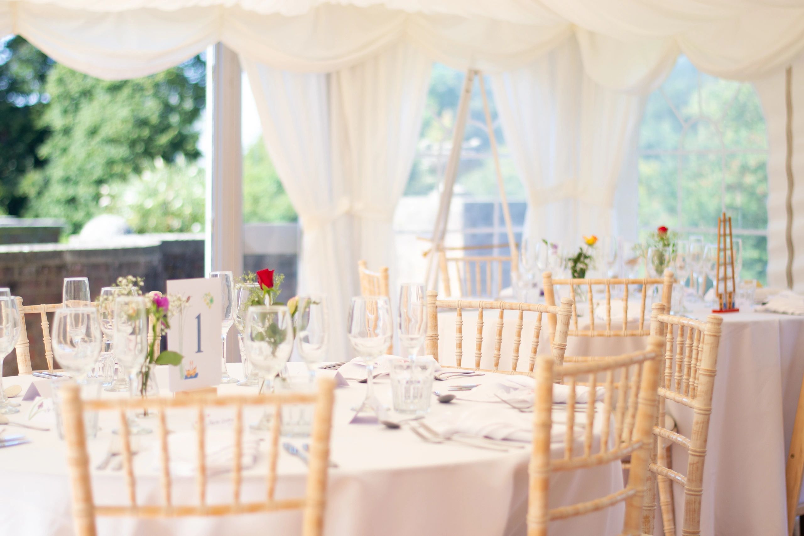 Elegant event table styling in a marquee